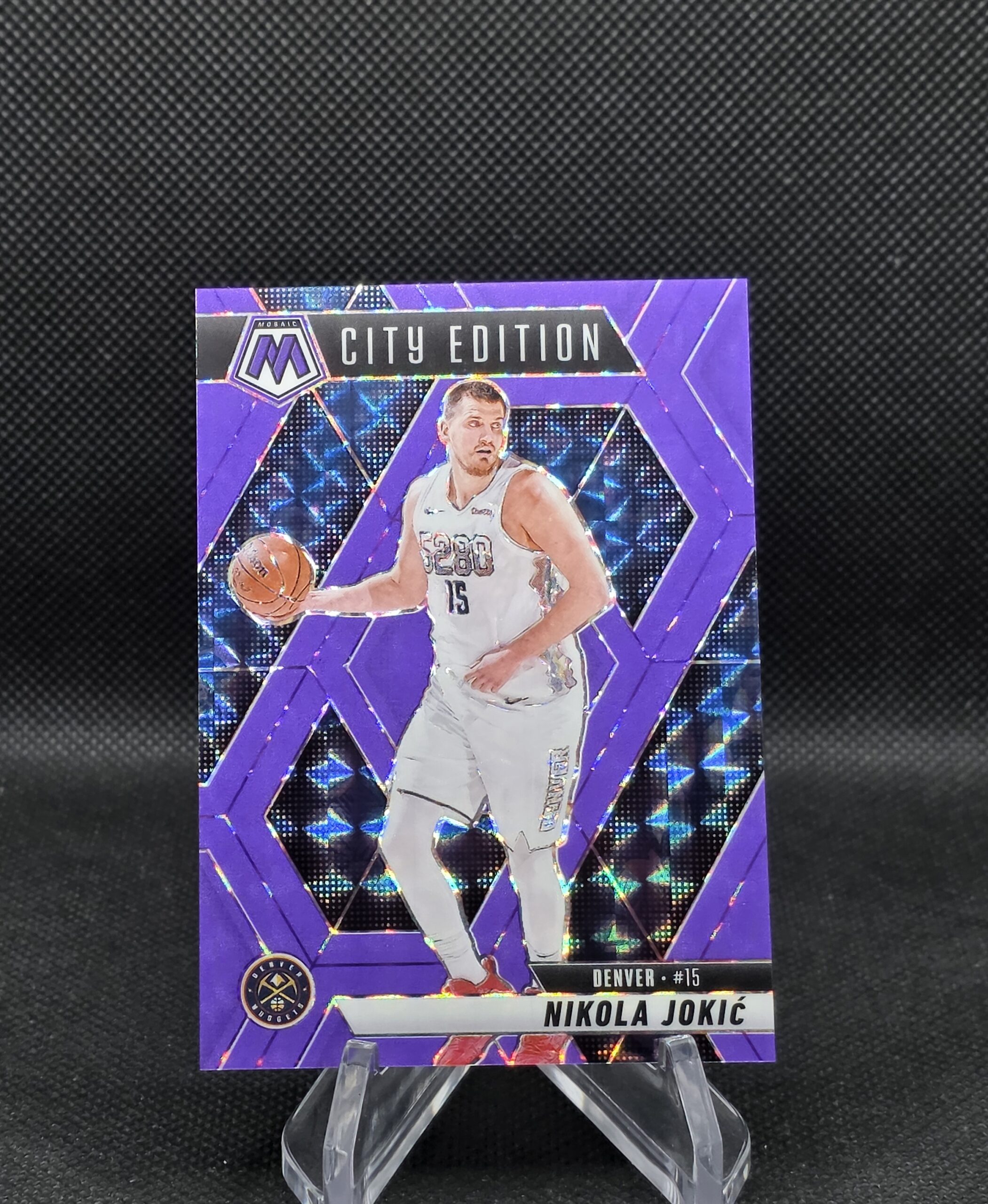 Nikola Jokić /249 City Edition Purple Prizm – 2024-25 Mosaic