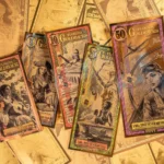 Goldbacks physical gold currency notes displayed showing intricate artwork and gold content